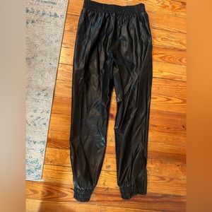 Worn once. Paid $70-90 in 2021. Has 2 pockets in front. Zipper by ankle.